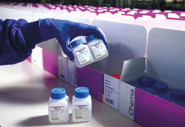 a chemist holding Chema products