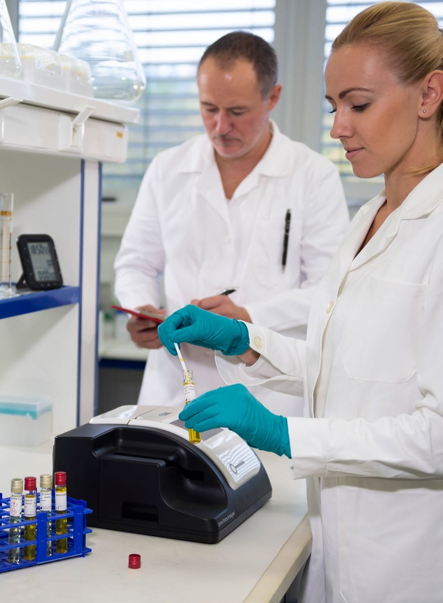 chemist using EC 90 Electrolyte Analyzer