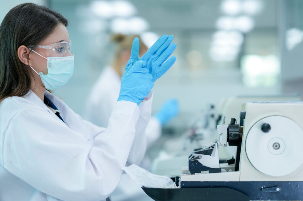 A medical technologist working with a sample.